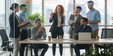 Diverse team collaborating, fostering curiosity and innovation in a modern office.